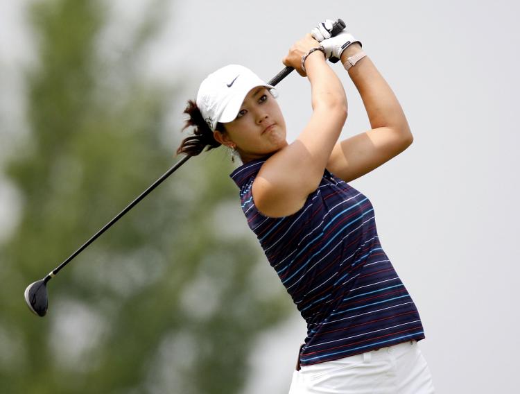 Michelle Wie watches her tee shot on the ninth hole during the third round of the State Farm Classic at Panther Creek Country Club on July 19, 2008 in Springfield, Illinois. (Gregory Shamus/Getty Images) Michelle Wie watches her tee shot on the ninth hole during the third round of the State Farm Classic at Panther Creek Country Club on July 19, 2008 in Springfield, Illinois. (Gregory Shamus/Getty Images)