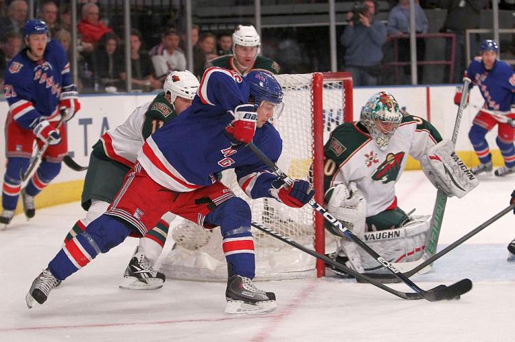 SHOW STOPPER: Minnesota Wild goalie Jose Theodore (R) shut down the Mats Zuccarello (center) and the New York Rangers after giving up an early goal during Thursday night's game at Madison Square Garden. (Nick Laham/Getty Images) SHOW STOPPER: Minnesota Wild goalie Jose Theodore (R) shut down the Mats Zuccarello (center) and the New York Rangers after giving up an early goal during Thursday night's game at Madison Square Garden. (Nick Laham/Getty Images)
