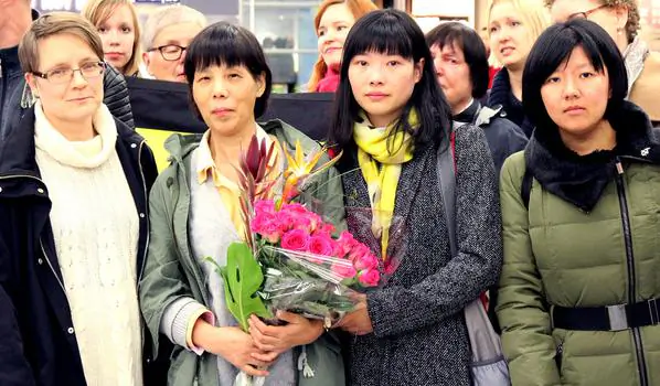 Chen Zhenping pictured with her daughter in Finland on Oct. 9. (NTD Television)