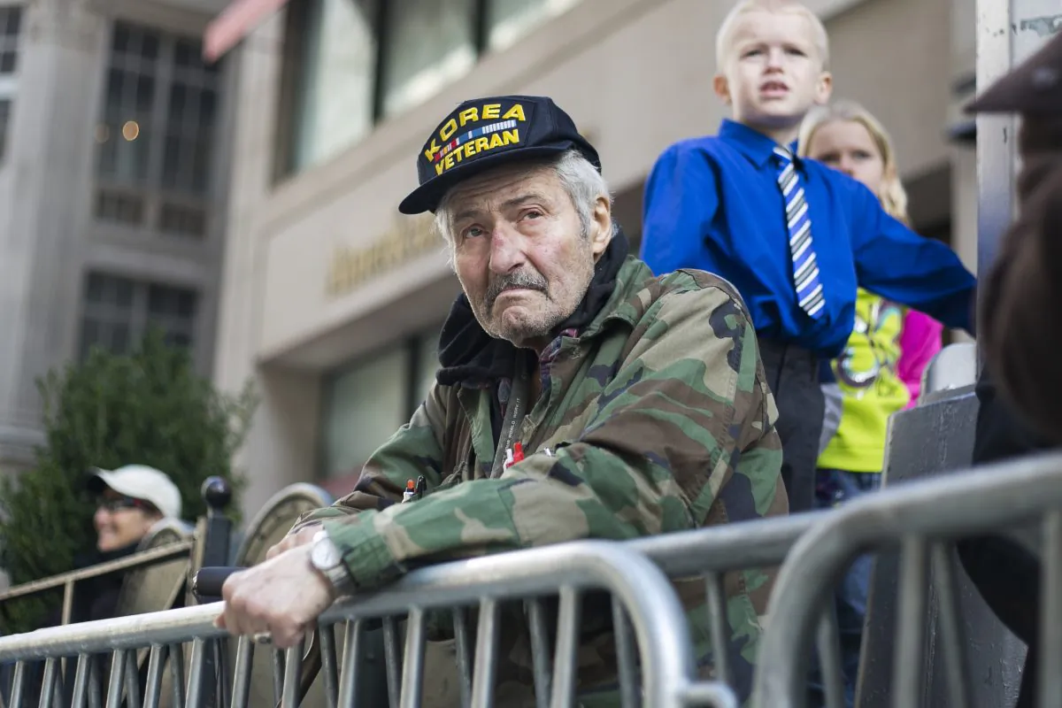 A veteran watches the Veterans' Day Parade in New York on Nov. 11, 2014. (Samira Bouaou/Epoch Times)
