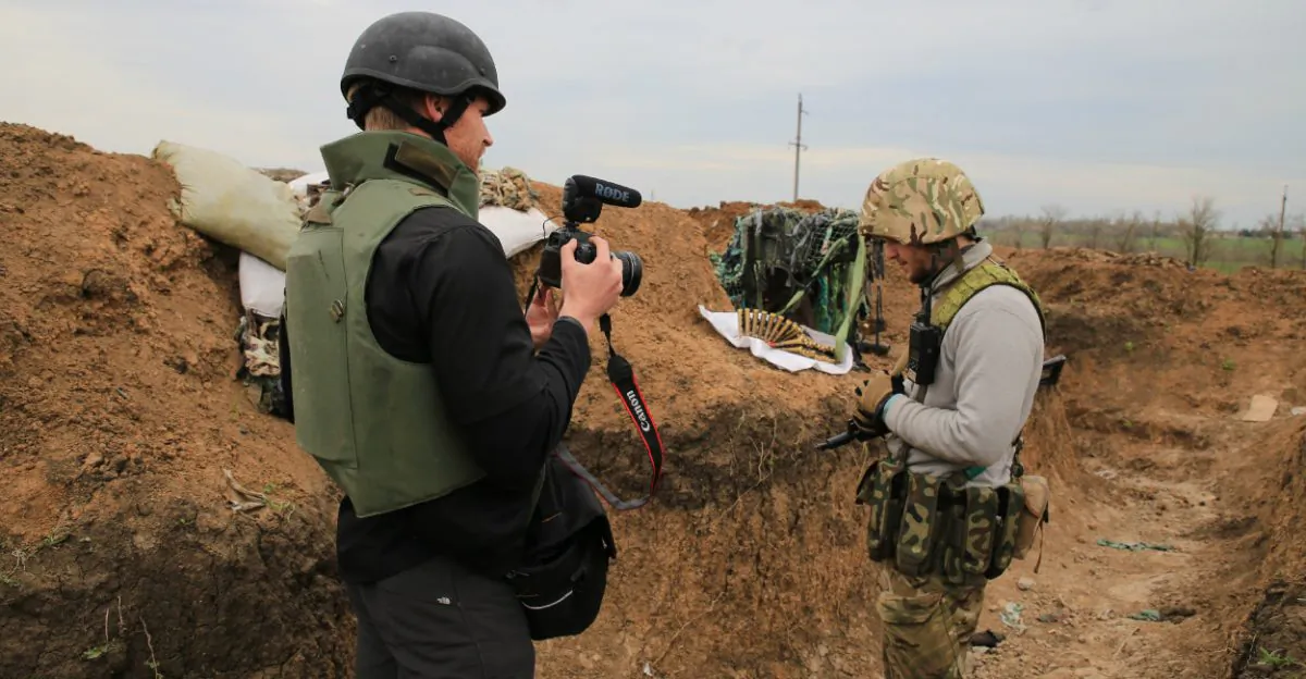 The author, Nolan Peterson, in the Ukrainian trenches in Shyrokyne, eastern Ukraine. (Nolan Peterson/The Daily Signal)
