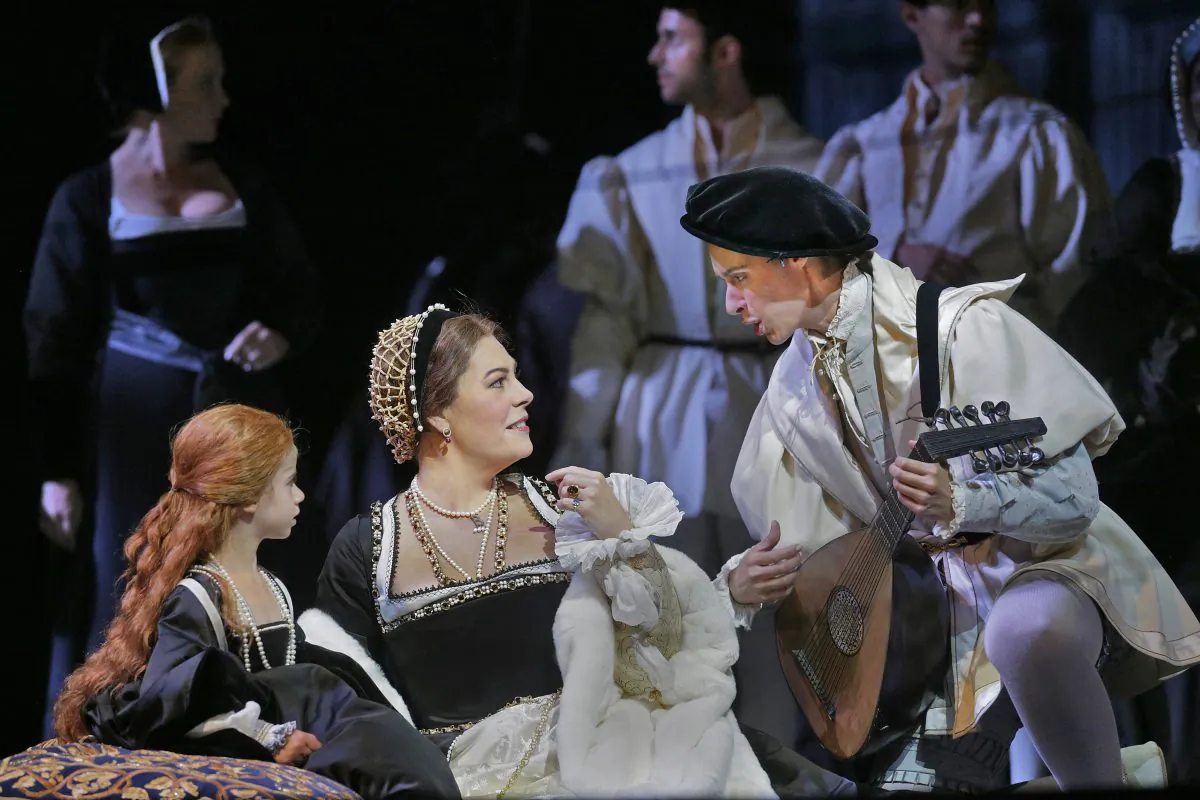 (L–R) Olivia Shidler as Elizabeth, Sondra Radvanovsky in the title role, and Tamara Mumford as Smeton in Donizetti's "Anna Bolena." (Ken Howard/Metropolitan Opera)
