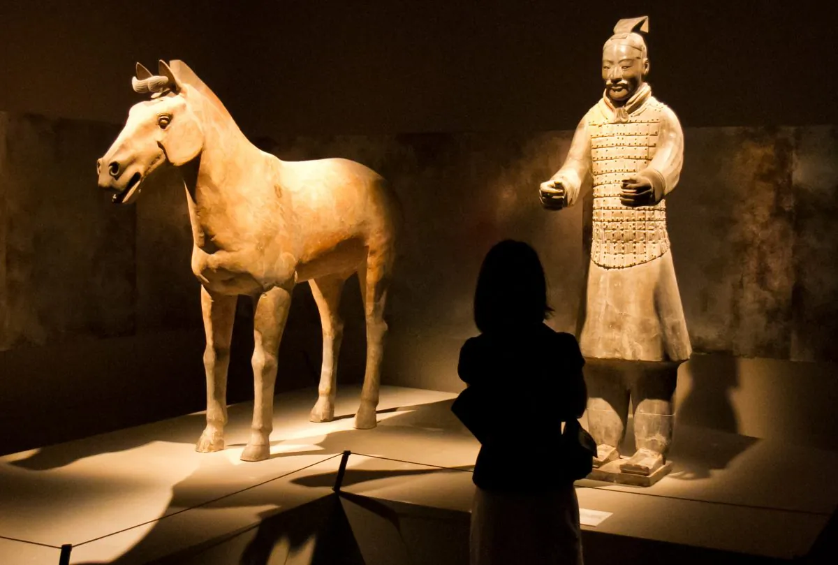 The statues of the Terracotta Warriors from 210-209 BC that were berried with Emperor Qin, the First Emperor of China, are on display along with other artifacts found in Times Square at the Discovery Museum on May 15, 2012. (Benjamin Chasteen/The Epoch Times)