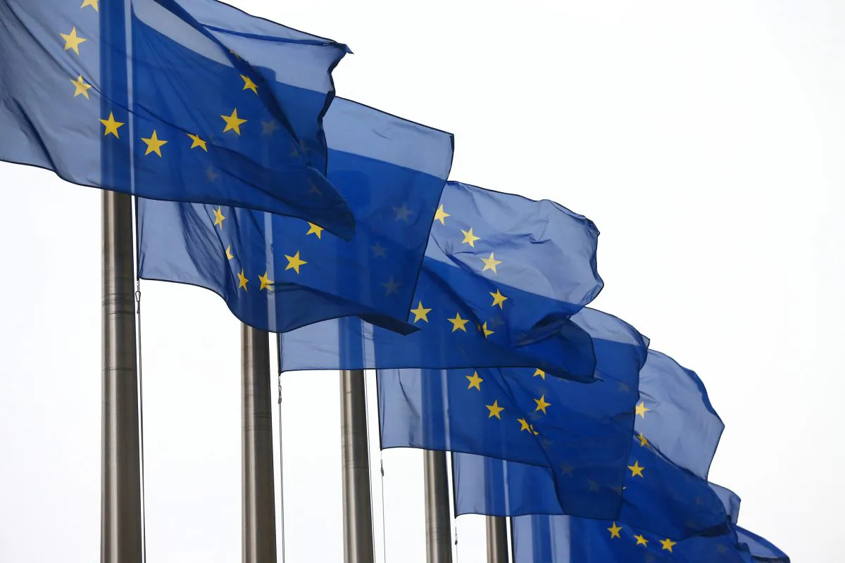 European Union flags outside the European Commission building in Brussels, Belgium, on Oct. 24, 2014. (Carl Court/Getty Images)