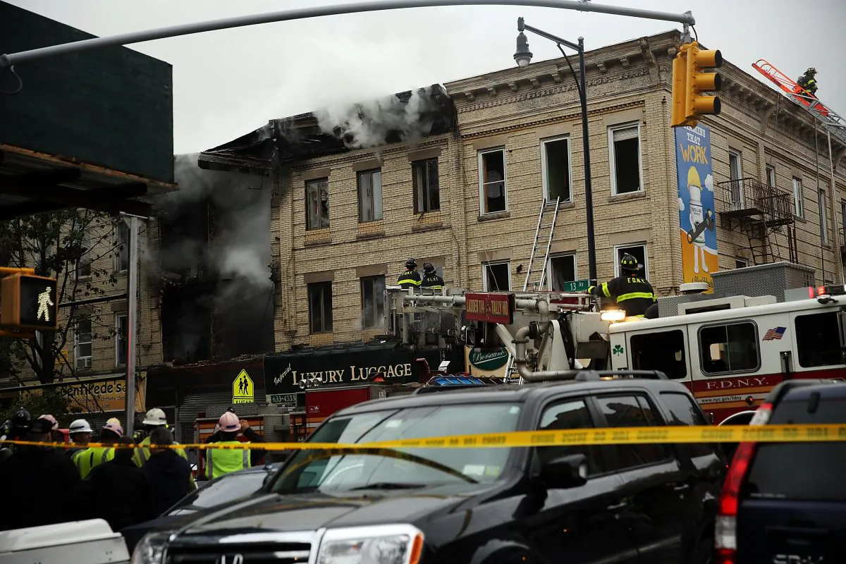 A gas explosion occurred in Borough Park neighborhood on October 3, 2015 in the Brooklyn borough of New York City. Over 100 firefighters responded to the afternoon explosion and fire in the densely populated neighborhood. Two people were killed. (Spencer Platt/Getty Images)