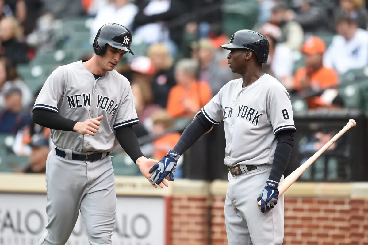 Didi Gregorius (R) and Greg Bird are two important Yankee players, yet they're not stars—something the Yankees are lacking. (Mitchell Layton/Getty Images)