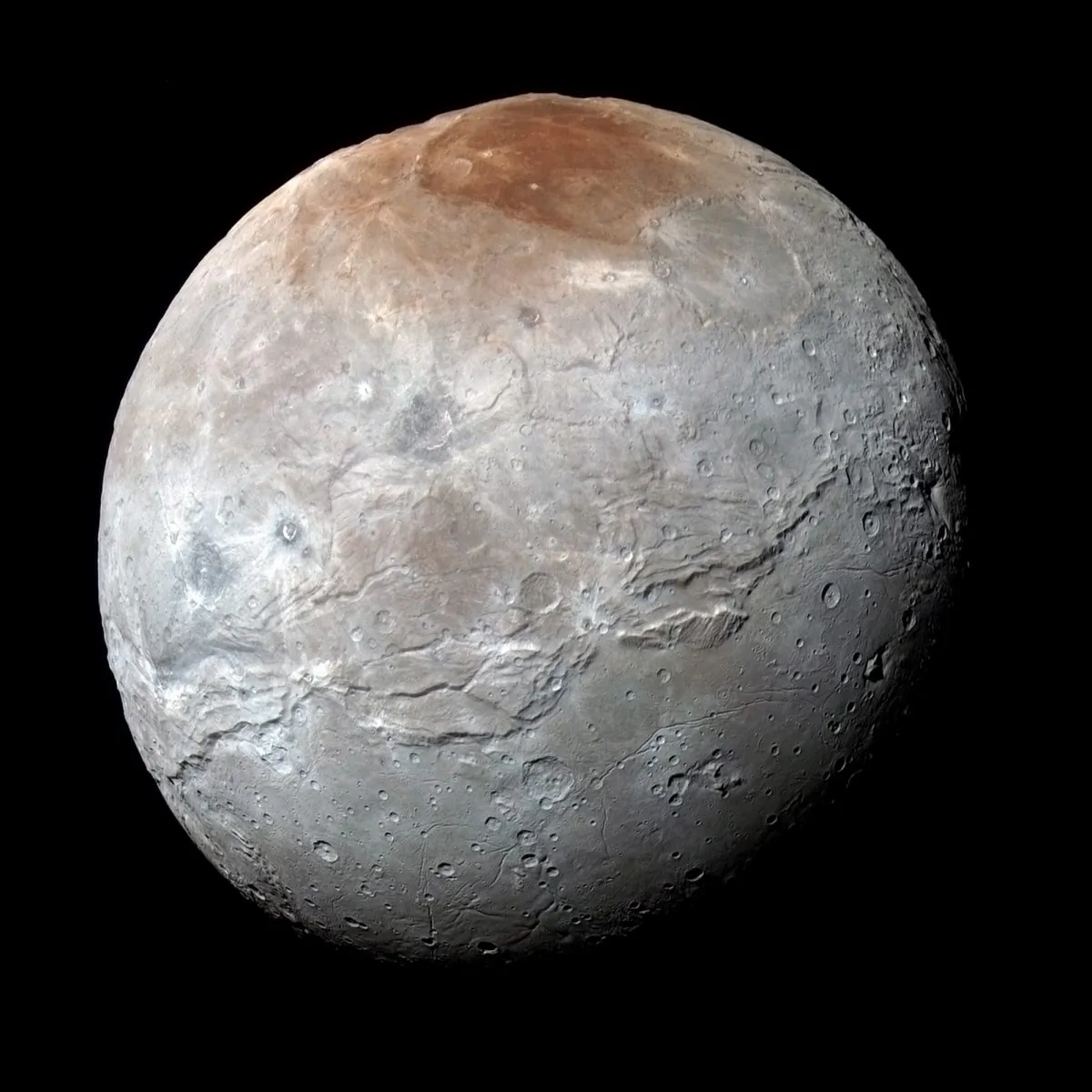 Charon has a huge fracture system, unlike anything seen on Pluto.(NASA/JHUAPL/SwRI)