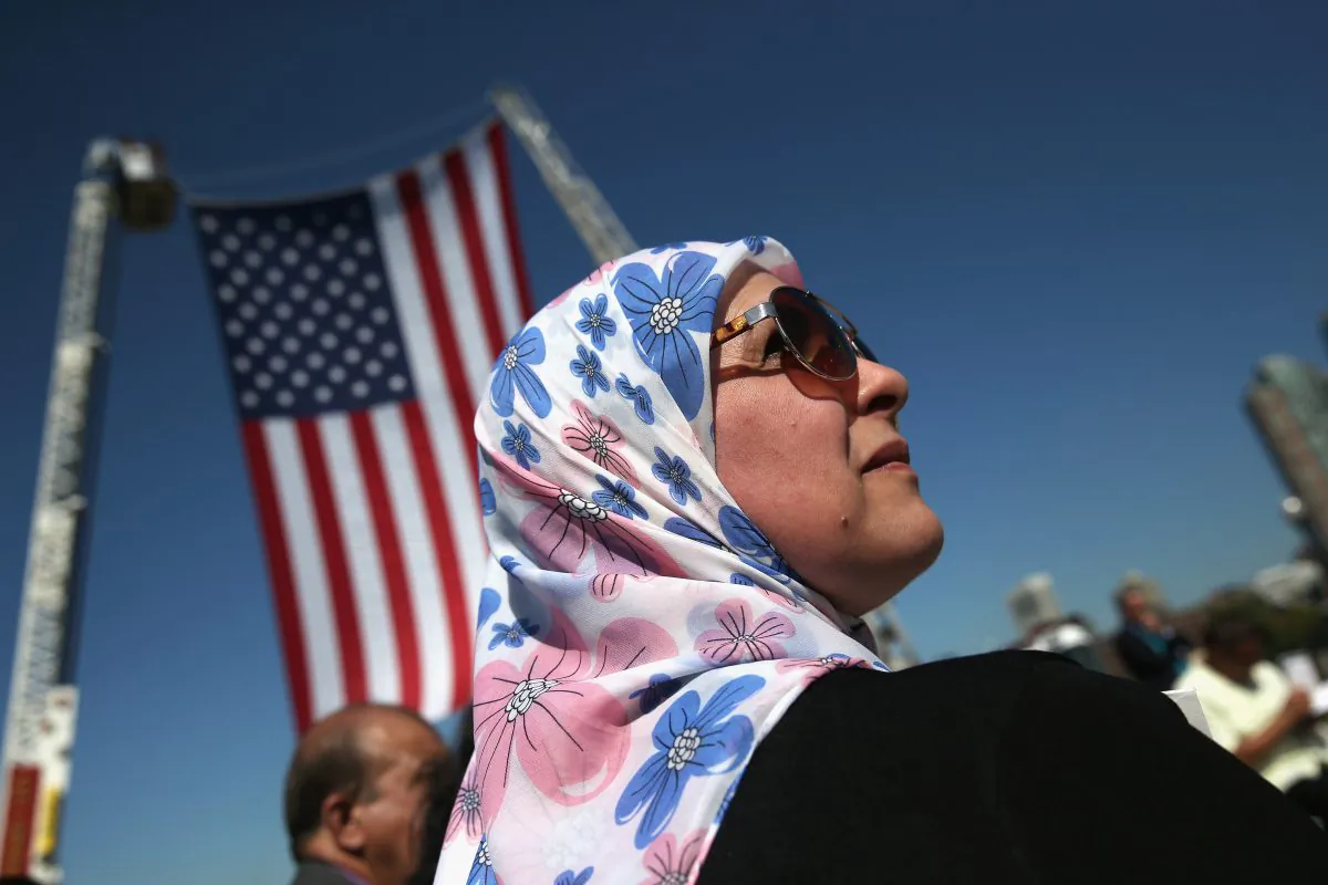 An Algerian immigrant becomes an American citizen during a naturalization ceremony at Liberty State Park in Jersey City, New Jersey, on on September 17, 2015. (John Moore/Getty Images)