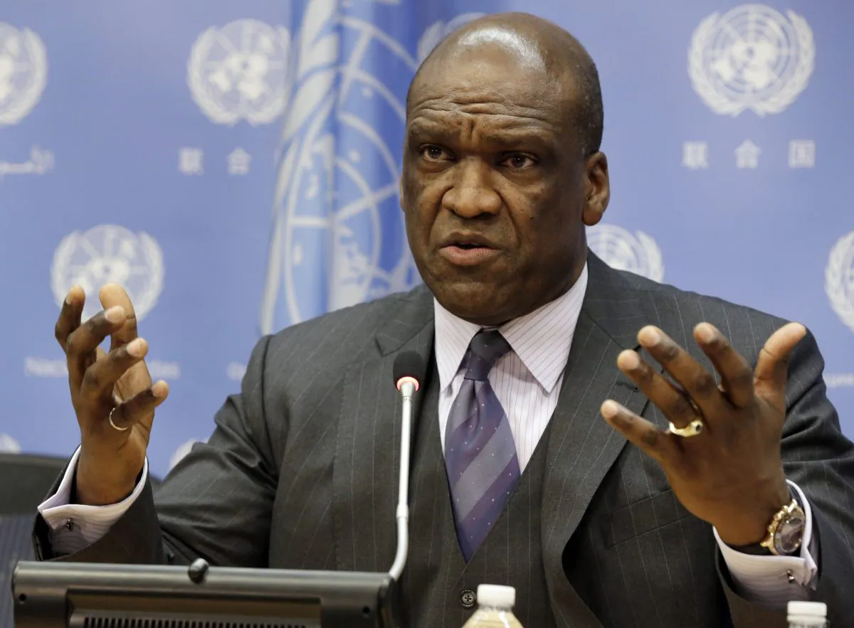 In this Sept. 17, 2013, file photo, Ambassador John Ashe, of Antigua and Barbuda, the President of the General Assembly 68th session, speaks during a news conference at United Nations headquarters. (AP Photo/Richard Drew)