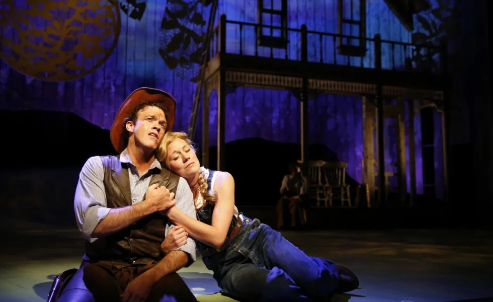 (L–R) Colte Julian plays Curly and Allison Sill appears as Laurey in Paramount Theatre's production of "Oklahoma!" (Liz Lauren)
