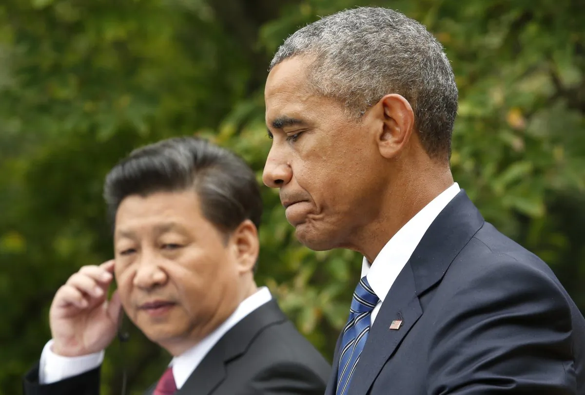 US President Barack Obama speaks next to Chinese President Xi Jinping at a joint press conference after their meeting at the White House in Washington,DC on September 25, 2015.      (YURI GRIPAS/AFP/Getty Images)