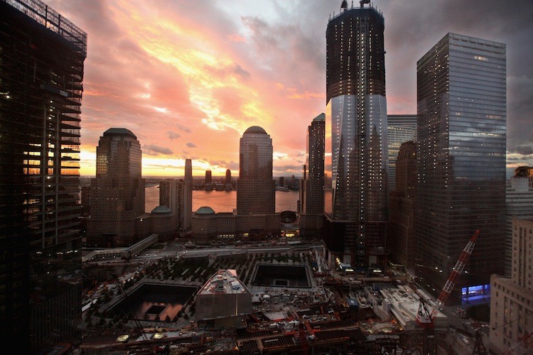 The sun sets over Jersey City and the World Trade Center site, with One World Trade Center to the right on August 28, 2011 in New York City. (Chip Somodevilla/Getty Images) The sun sets over Jersey City and the World Trade Center site, with One World Trade Center to the right on August 28, 2011 in New York City. (Chip Somodevilla/Getty Images)