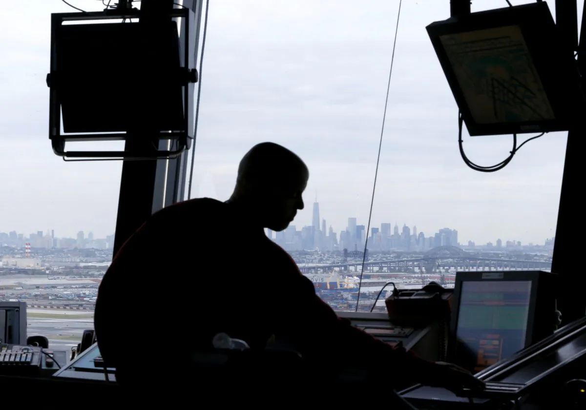 An air traffic controller works in the tower at Newark Liberty International Airport in Newark, N.J., on May 21, 2015. (Julio Cortez/AP Photo)