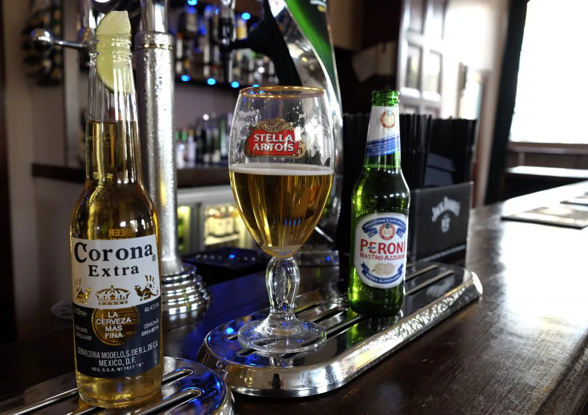Drinks sit on the bar in a pub in London, Tuesday, Oct. 13, 2015. (AP Photo/Kirsty Wigglesworth)