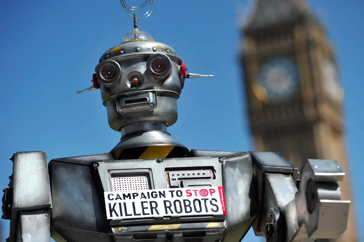 A mock "killer robot" is pictured in central London on April 23, 2013, during the launching of the Campaign to Stop Killer Robots, which calls for the ban of lethal robot weapons that would be able to select and attack targets without any human intervention. The campaign calls for a pre-emptive and comprehensive ban on the development, production, and use of fully autonomous weapons. (Carl Court/AFP/Getty Images)