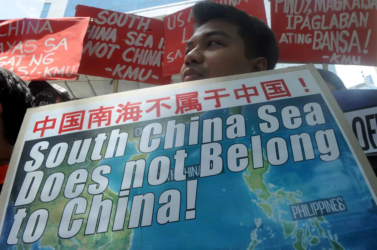 Activists hold a protest in front of the Chinese Consular Office in Manila, Philippines, on July 7, 2015, against China's claims, construction activities, and military build-up on the South China Sea. (Jay Directo/AFP/Getty Images)