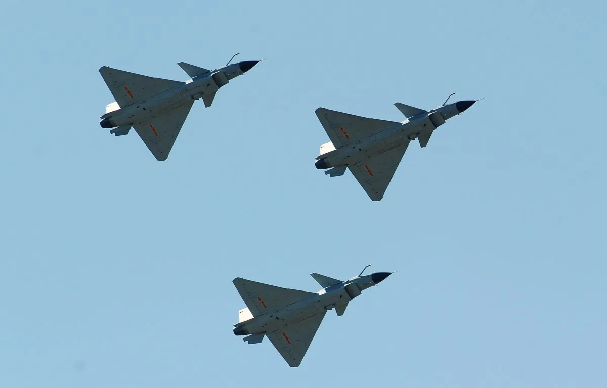 Chinese J-10 fighter jets fly on display over the Yangcun Air Force base of the People's Liberation Army Air Force in Tianjin, China, on April 13, 2010. (Frederic J. Brown/AFP/Getty Images)