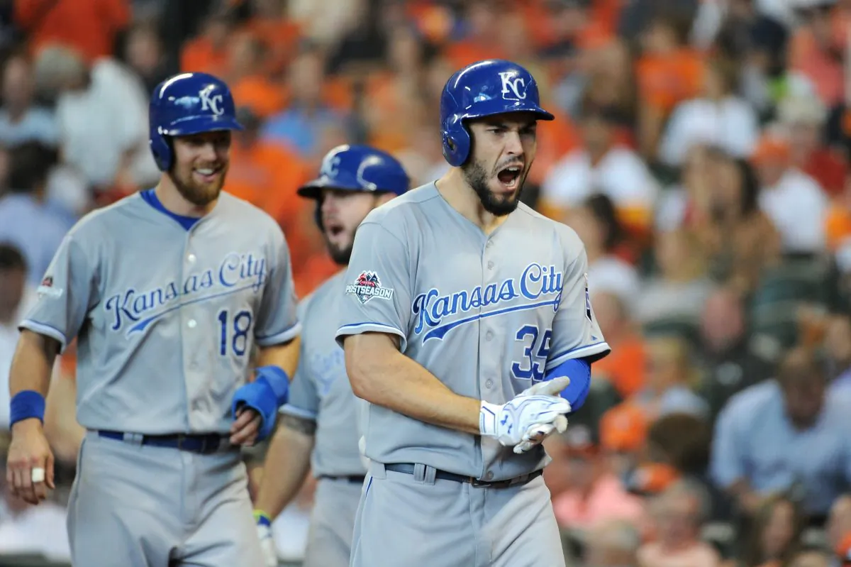 Eric Hosmer's (R) two-run home run in the ninth inning of Game 4 of the ALDS capped a seven-run, two-inning rally that allowed the Royals to tie the series at two games apiece. (Eric Christian Smith/Getty Images) 