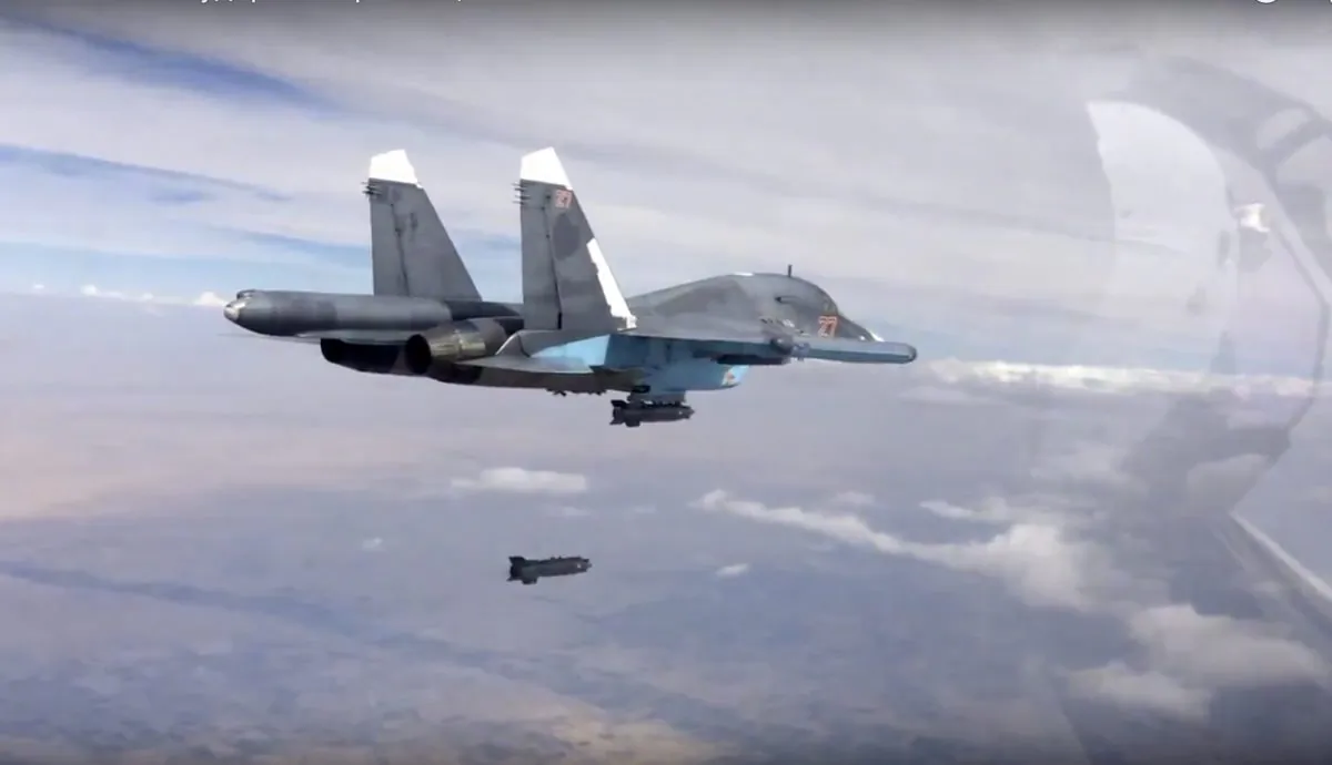 In this file photo made from the footage taken from Russian Defense Ministry official website on Friday, Oct. 9, 2015, a bomb is released from Russian Su-34 strike fighter in Syria. (Russian Defense Ministry Press Service via AP)