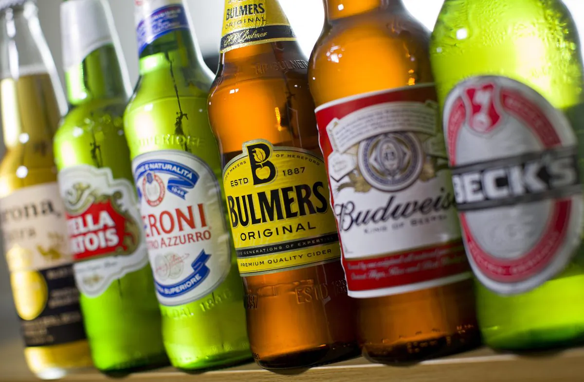 Bottles of beer and cider produced by Belgian-Brazilian group Anheuser-Busch InBev, (Budweiser, Corona, Stella, and Beck's) and British brewer SABMiller. (Justin Tallis/AFP/Getty Images)
