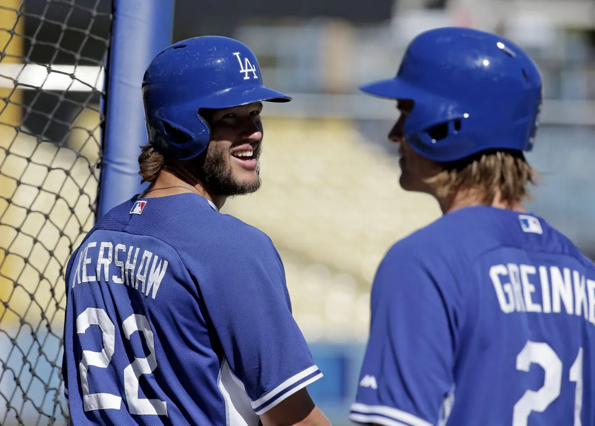 Los Angeles Dodgers ace starting pitchers Clayton Kershaw (L) and Zack Greinke hold the key to the team's postseason success. (AP Photo/Chris Carlson)