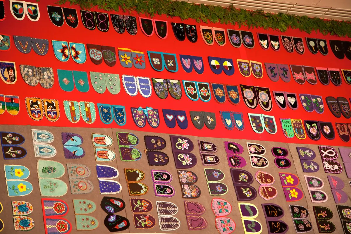 Moccasin vamps, handmade by friends and relatives of missing or murdered aboriginal women, comprise "Walking With Our Sisters," a travelling commemorative currently on display at Carleton University in Ottawa. (Melody McKiver)