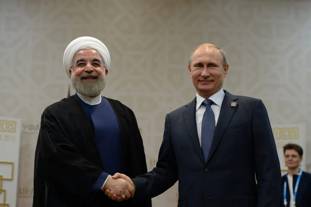 Russian President Vladimir Putin (R) and Iran's President Hassan Rouhani at the BRICS/SCO Summits in Ufa, Russia, on July 9, 2015. (Alexey Filippov/Ria Novosti via Getty Images)