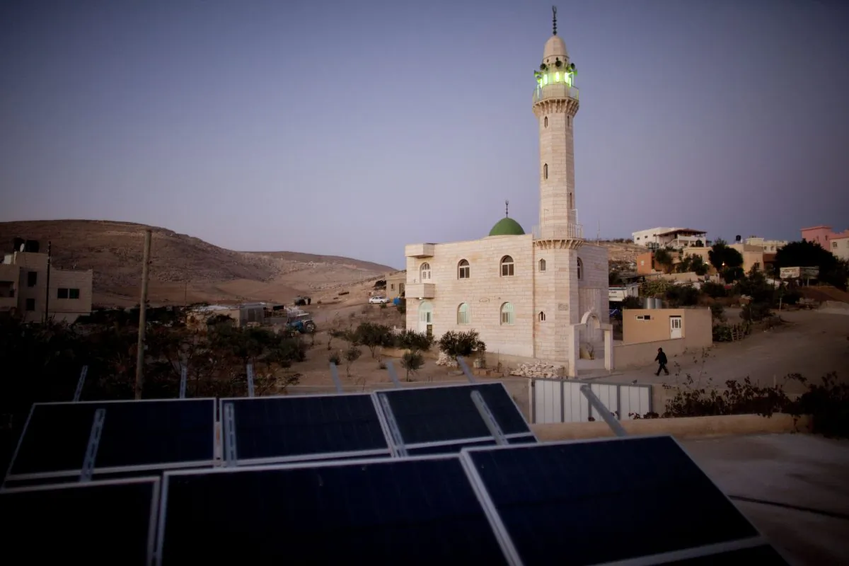 Photovoltaic solar panels provide electricity to a private home in the Bedouin Arab village of Darajat in Israel's Negev desert on November 23, 2009. (Uriel Sinai/Getty Images)