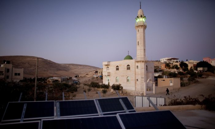 Photovoltaic solar panels provide electricity to a private home in the Bedouin Arab village of Darajat in Israel's Negev desert on November 23, 2009. (Uriel Sinai/Getty Images)