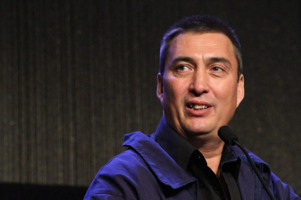 John Baker, the 2011 winner of the Iditarod Trail Sled Dog Race, speaks  Friday, Oct. 16, 2015, at the Alaska Federation of Natives conference in Anchorage, Alaska. (AP Photo/Mark Thiessen)