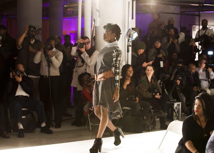 A model wearing an Amparo dress walks the runway. (Samira Bouaou/The Epoch Times)