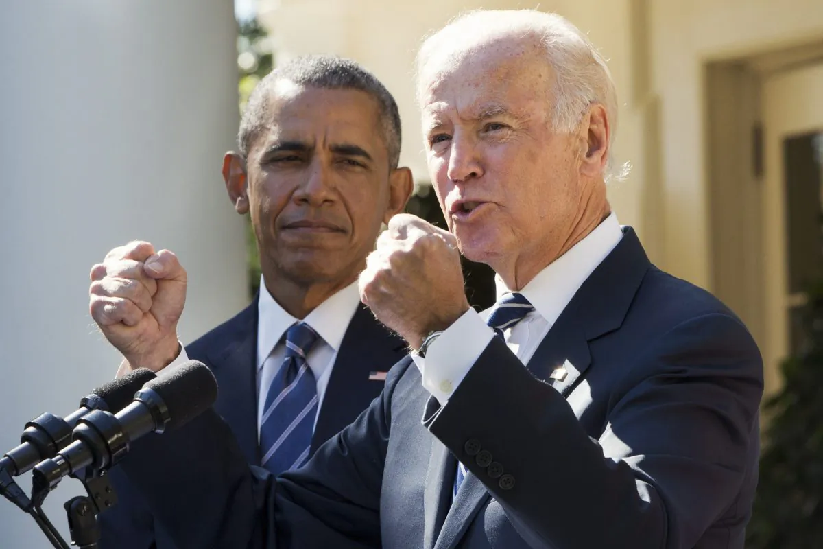 Vice President Joe Biden, with President Barack Obama, gestures as he speaks in the Rose Garden of the White House in Washington, on Oct. 21, 2015, to announce that he will not run for the presidential nomination. (Jacquelyn Martin/AP Photo)