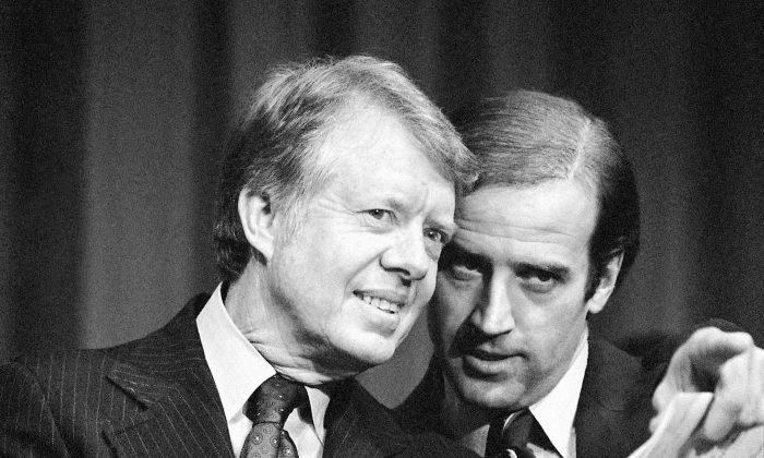 President Jimmy Carter listens to Sen. Joseph R. Biden (D-Del.), as they wait to speak at a fundraising reception at Padua Academy in Wilmington, on Feb. 20, 1978. (Barry Thumma/AP Photo)