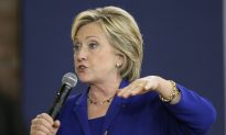 Clinton Questions Plans for Health Insurers to Merge
