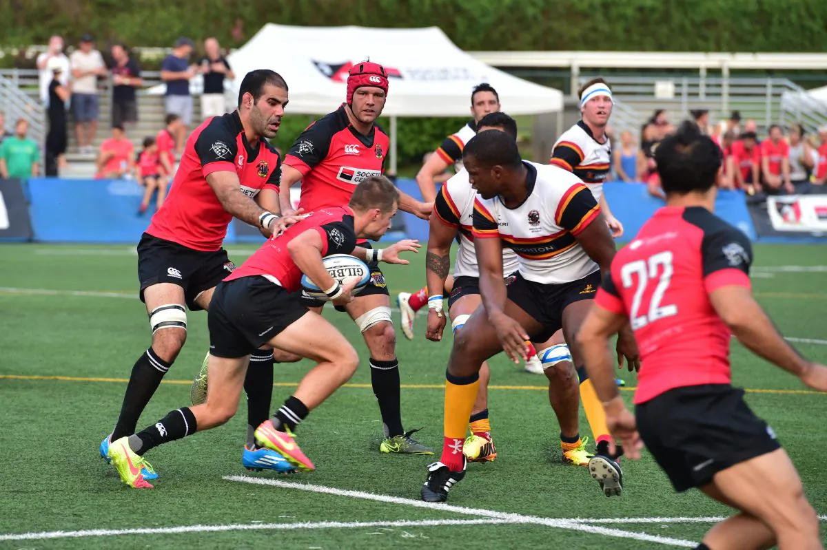 Adam Rolston of Societe Generale Valley driving forward, with Thomas Lamboley in support during their 25-0 win against Leighton Asia HKCC at the Valley Ground on Saturday Oct 11. (Bill Cox/Epoch Times)