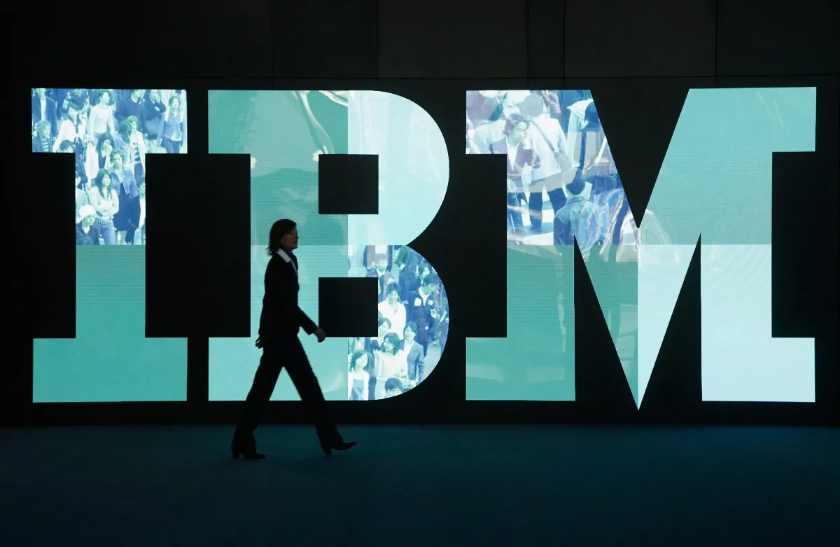 A woman walks past the IBM logo at the CeBIT technology trade fair in Hanover, Germany, on Feb. 28, 2011. (Sean Gallup/Getty Images)