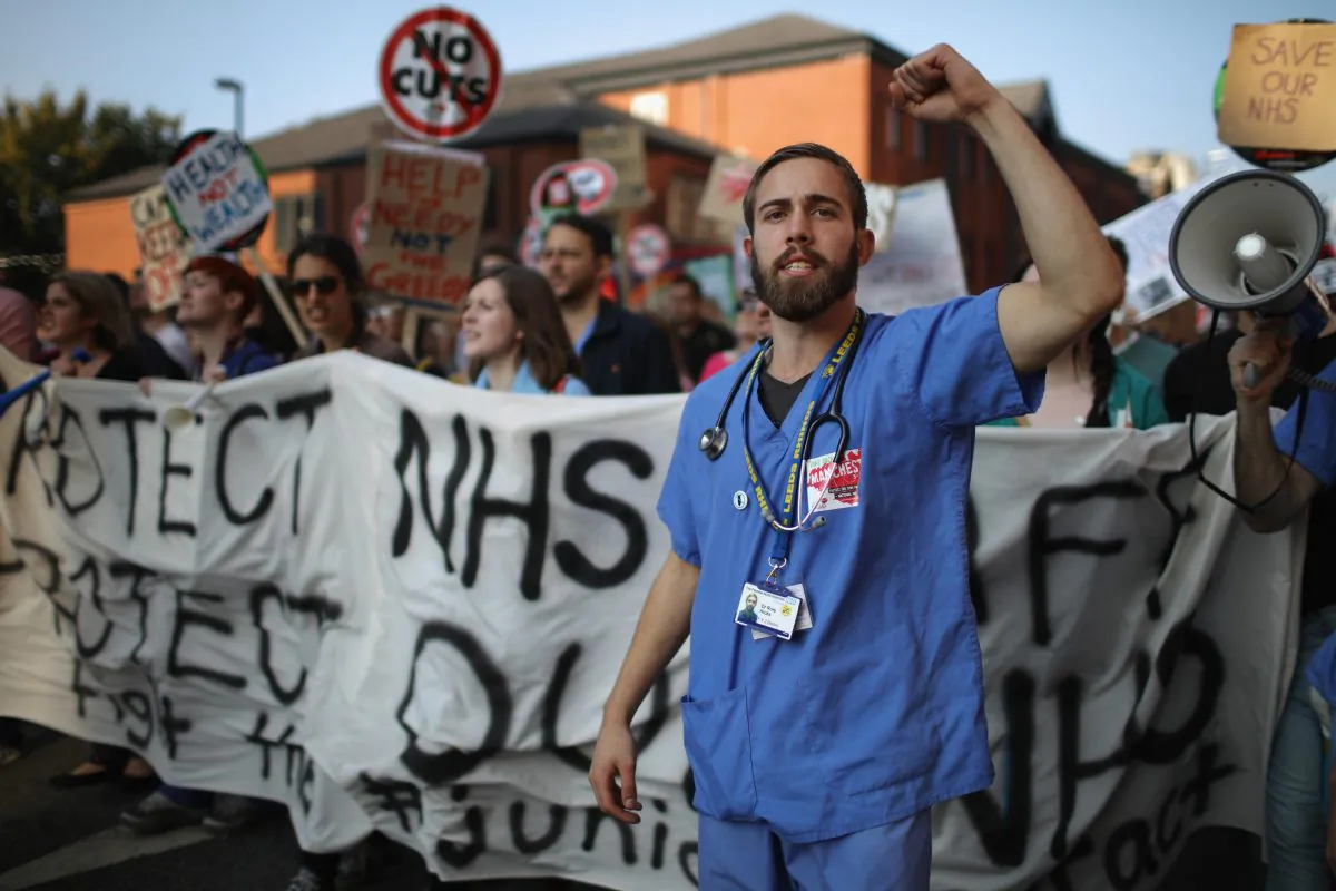 NHS workers take part in an anti-austerity protest in Manchester, England, on Oct. 4, 2015. (Christopher Furlong/Getty Images)