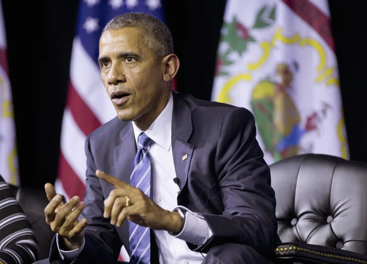 President Barack Obama answers questions from members of the audience during a community forum at the East End Family Resource Center in Charleston, W.Va., on Wednesday, Oct. 21, 2015. Obama is in Charleston to lead a community discussion on prescription drug abuse and heroin epidemic. (AP Photo/Pablo Martinez Monsivais)