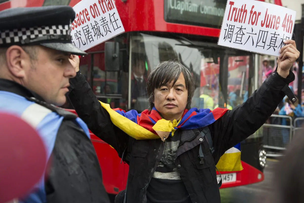 Tiananmen survivor and democracy activist Shao Jiang was arrested at a protest during Xi Jinping’s state visit (Si Gross/Epoch Times)