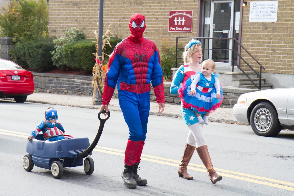 Port Jervis Halloween Parade participants walking up Pike Street in Port Jervis on Oct. 25, 2015. (Holly Kellum/Epoch Times)