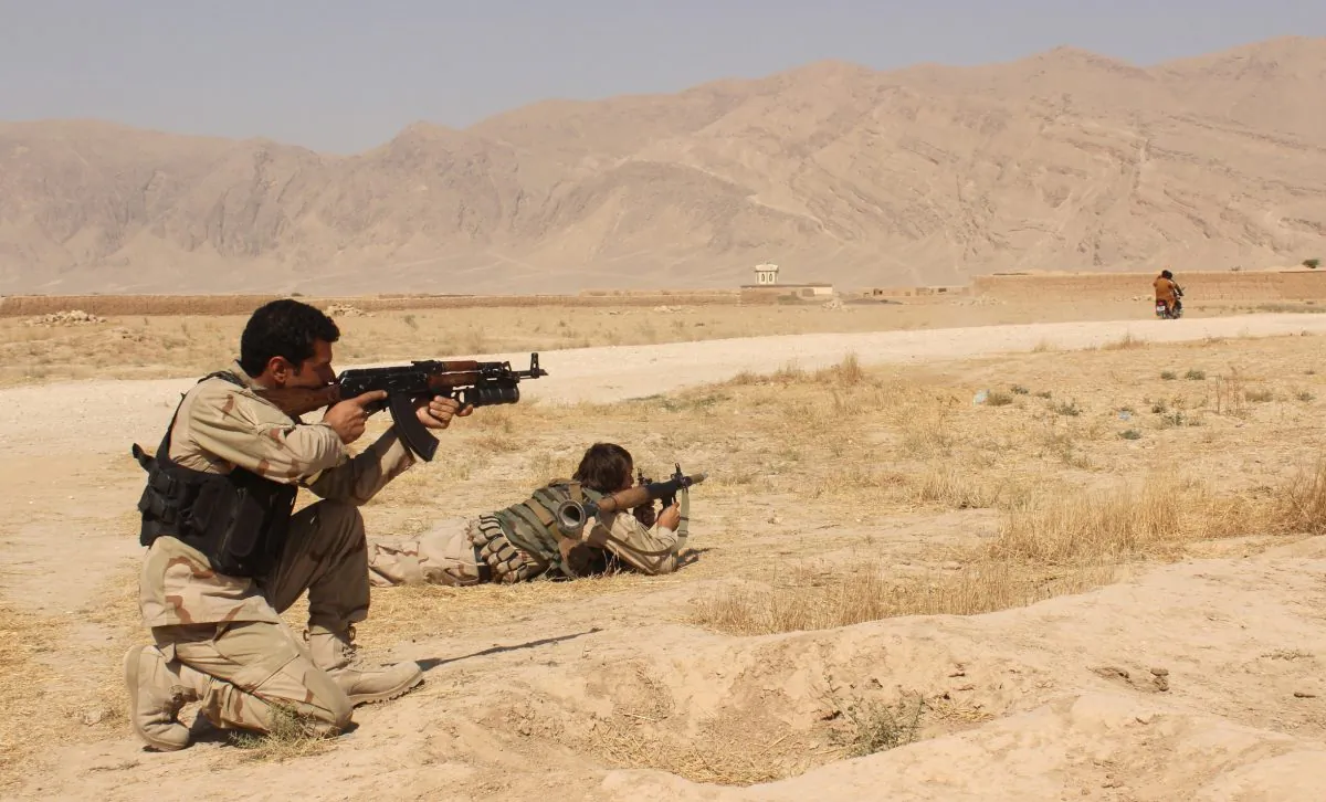 Afghanistan's security forces take their position during a clash by Taliban fighters in the highway between Balkh province to Kunduz city, north of Kabul, Afghanistan, Thursday, Sept. 1, 2015. (AP Photo)