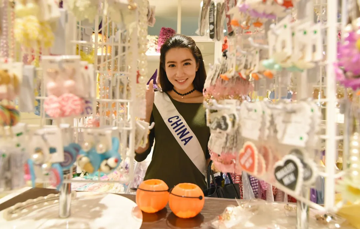 Miss China visits the Shibuya 109 shopping mall in Tokyo on October 23, 2015. (TORU YAMANAKA/AFP/Getty Images)