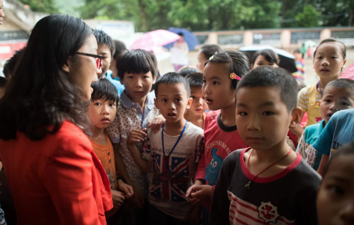 Children in the town of Xianghe, in southern China's Guangxi on June 19, 2015. (JOHANNES EISELE/AFP/Getty Images)