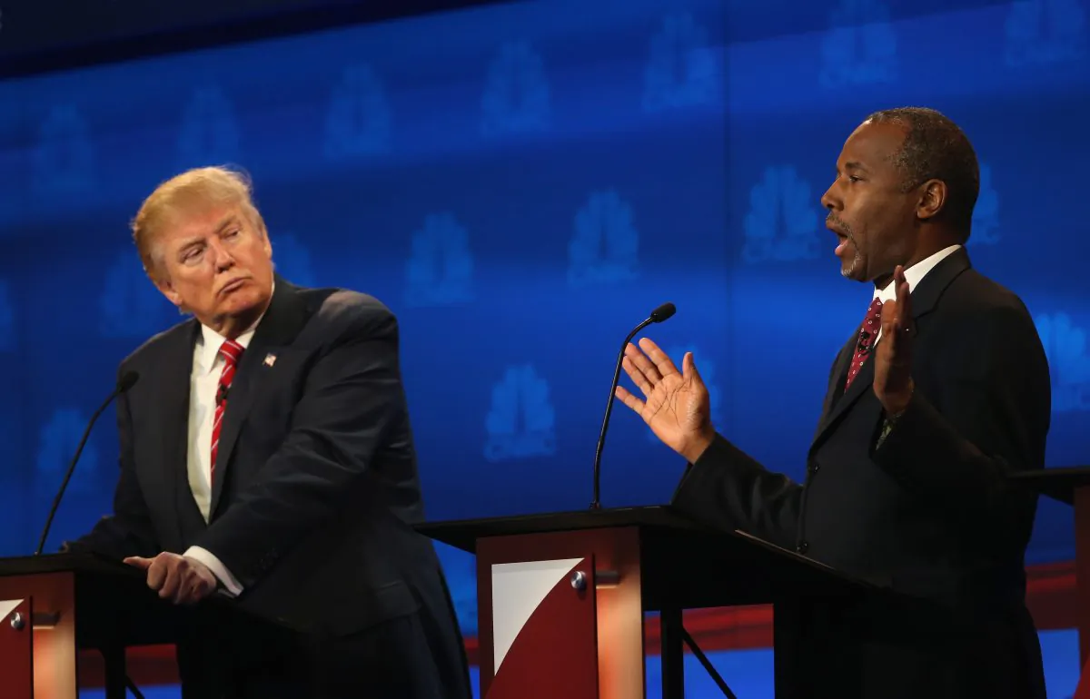 Presidential candidates Donald Trump (L) listens as Ben Carson speaks during the CNBC Republican Presidential Debate at University of Colorados Coors Events Center October 28, 2015 in Boulder, Colorado. (Justin Sullivan/Getty Images)