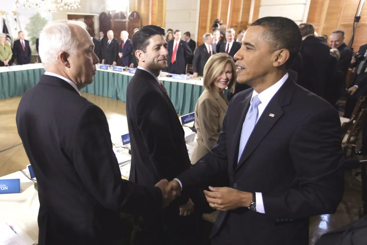 President Barack Obama (R) shakes hands with Rep. John Kline (R-Minn.), at Blair House in Washington, D.C., before a healthcare summit, on Feb. 25, 2010. (AP Photo/Pablo Martinez Monsivais)