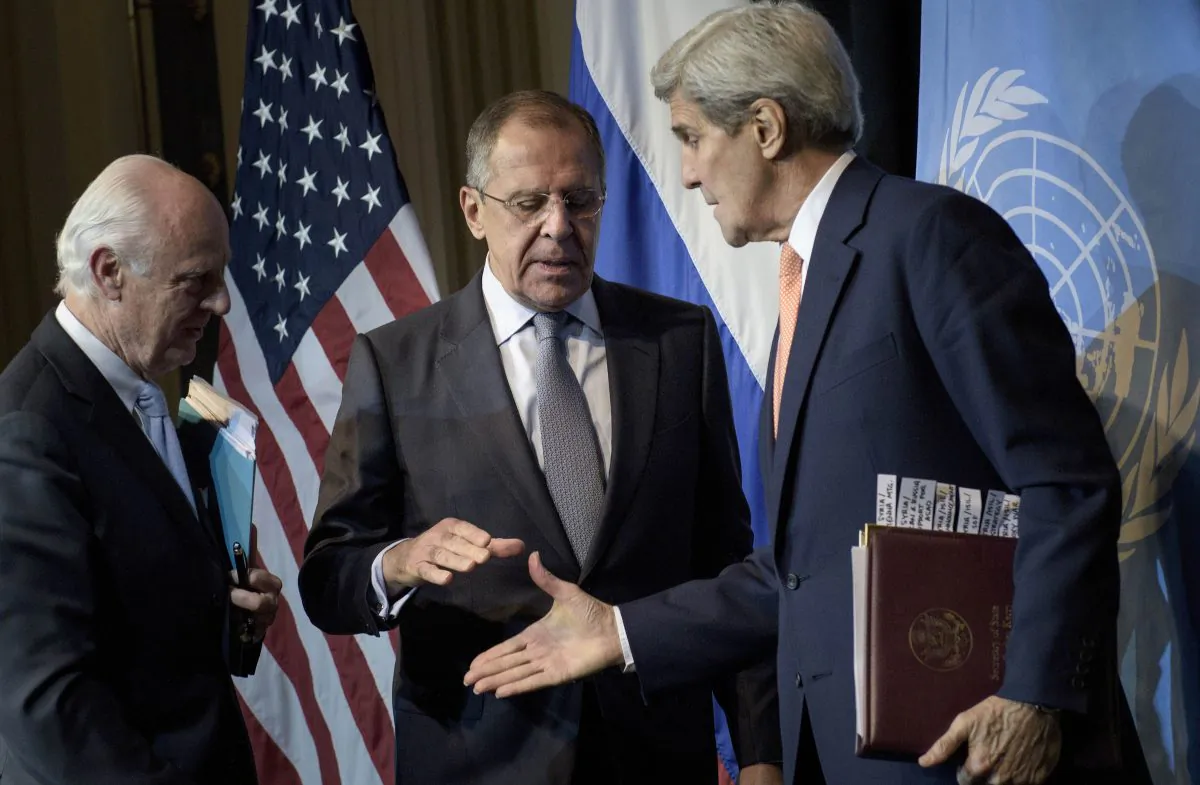 UN Special Envoy for Syria Staffan de Mistura (L) watches as Russian Foreign Minister Sergei Lavrov (C) and US Secretary of State John Kerry shake hands after a press conference at the Grand Hotel Oct. 30, 2015 in Vienna, Austria. (Brendan Smialowski/AFP/Getty Images)