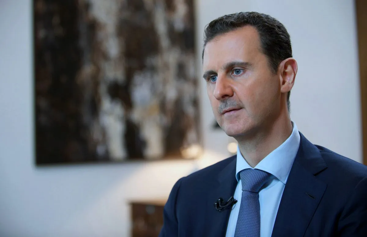 Syrian President Bashar Assad at an interview with the Iran's Khabar TV, in Damascus, Syria, on Oct. 4, 2015. (SANA via AP)