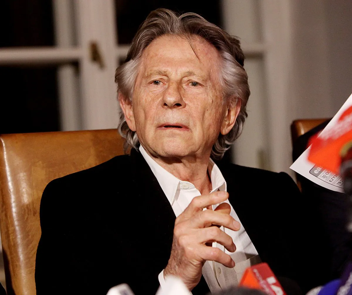 Filmmaker Roman Polanski tells reporters he can “breath with relief” after a Polish judge ruled that the law forbids his extradition to the U.S., where in 1977 he pleaded guilty to having sex with a minor, in Krakow, Poland, on Oct. 30, 2015. (AP Photo/Jarek Praszkiewicz)