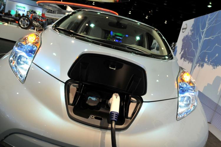 PLUGGED IN: The 2011 Nissan Leaf can go up to 100 miles on a single electric charge (Bryan Mitchell/Getty Images) PLUGGED IN: The 2011 Nissan Leaf can go up to 100 miles on a single electric charge (Bryan Mitchell/Getty Images)