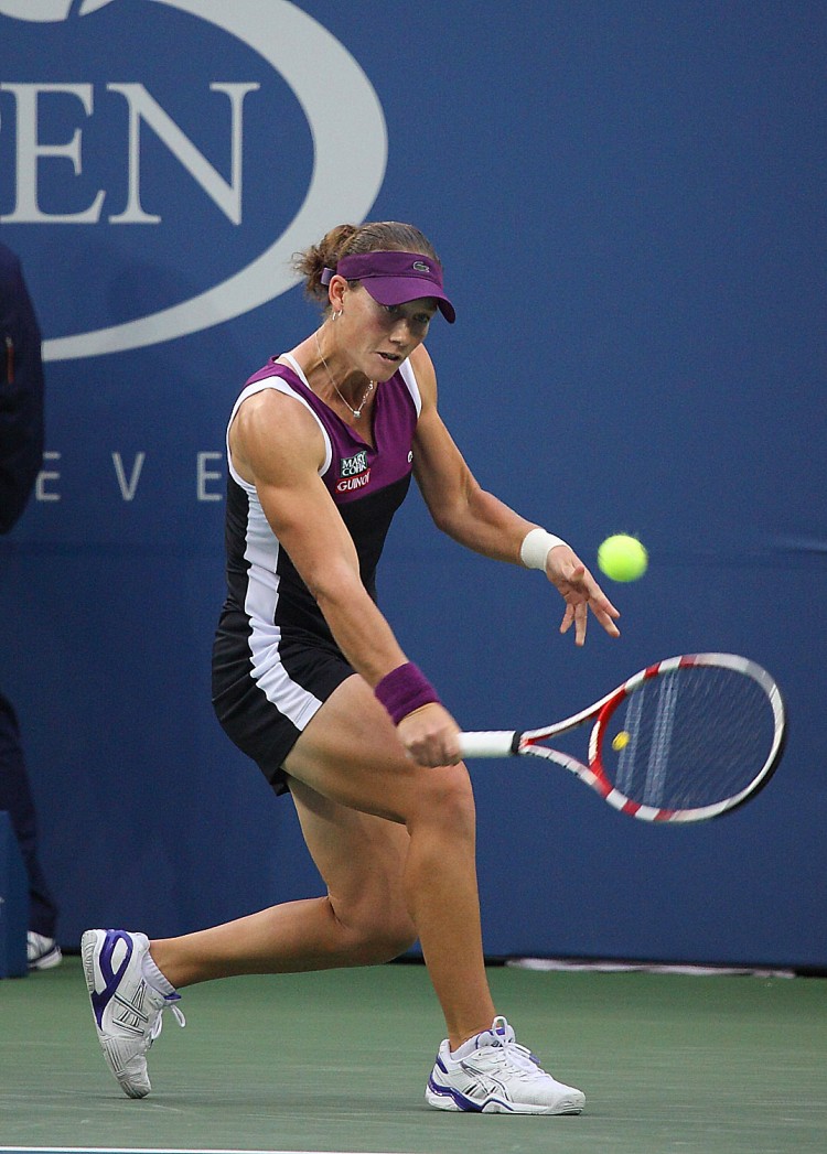 TRUE CHAMPION: Samantha Stosur returns a shot during the 2011 US Open women's final at Arthur Ashe Stadium in Flushing, New York on Sunday night. Stosur cruised to a straight set victory 6-2, 6-3 over three-time champion Serena Williams. (Gary Du/The Epoch Times) TRUE CHAMPION: Samantha Stosur returns a shot during the 2011 US Open women's final at Arthur Ashe Stadium in Flushing, New York on Sunday night. Stosur cruised to a straight set victory 6-2, 6-3 over three-time champion Serena Williams. (Gary Du/The Epoch Times)